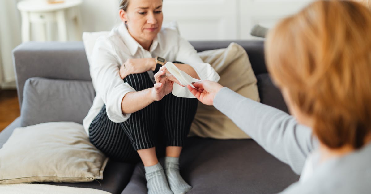 Giving XP to my ADC - Woman Giving Tissues to a Sad Woman