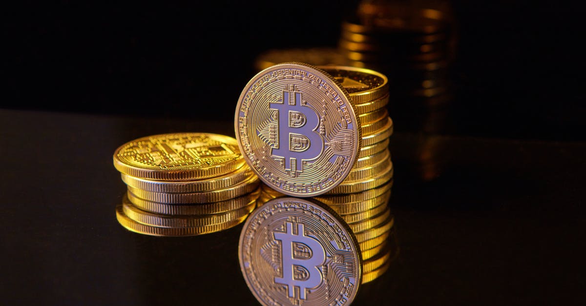 Gold Value Glitch - Silver and Gold Coins on Black Surface Gold Value Glitch - Silver and Gold Coins on Black Surface