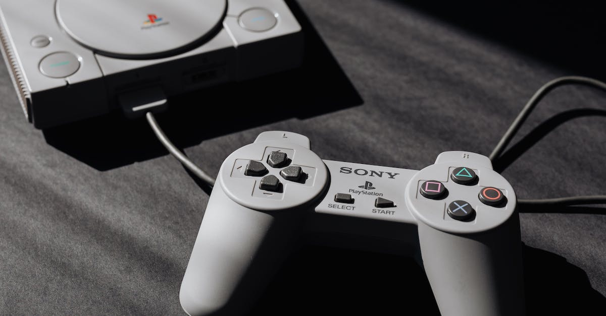 Got a Playstation Classic (PS1) and Games list shows two icons for it, is it safe to delete one? - Photo of Play Station Game Console and Remote Controller