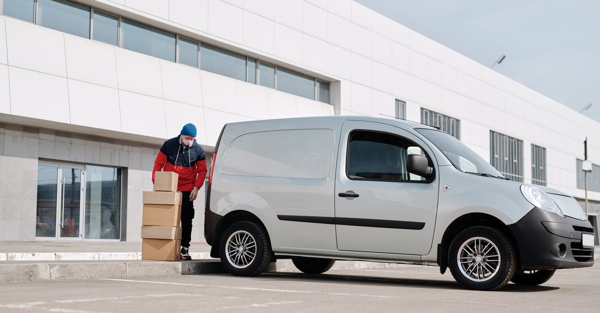 Grand Theft Auto V - Rockstar Game Services are unavailable - Delivery Man With Boxes next to a White Van Grand Theft Auto V - Rockstar Game Services are unavailable - Delivery Man With Boxes next to a White Van