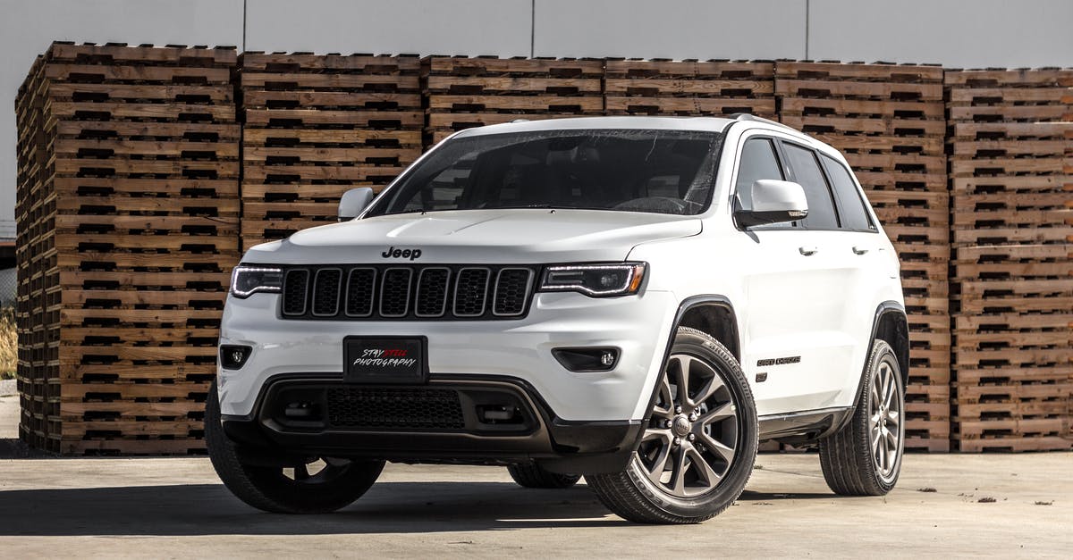 Grand Theft Auto V exited unexpectedly - Rockstar edition - White Jeep Cherokee Suv Near Stacked Brown Pallet Boards Grand Theft Auto V exited unexpectedly - Rockstar edition - White Jeep Cherokee Suv Near Stacked Brown Pallet Boards