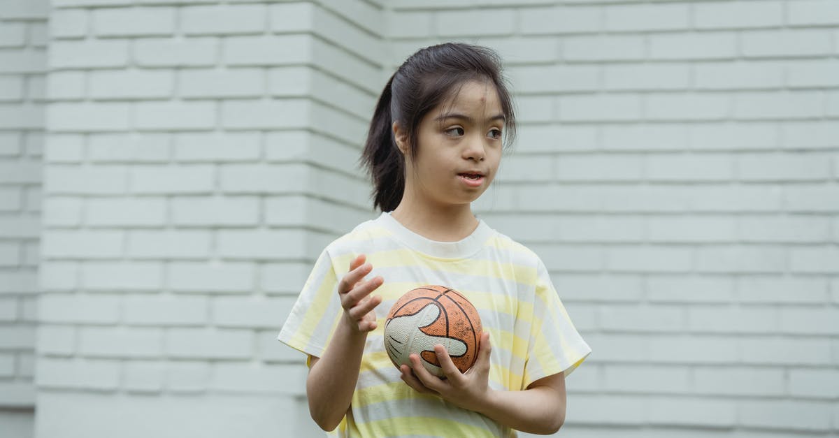 Great Ball at PokeStops - Girl in Yellow Dress Holding Basketball
