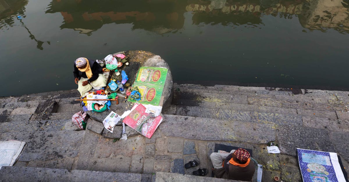 Gree Enclave Reputation Vendor available? - Children Sitting on Concrete Dock Near Body of Water
