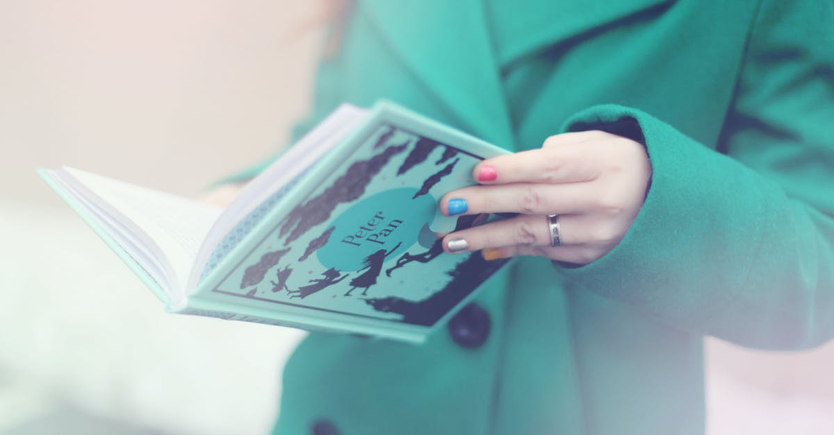 Green ring on resources - Woman Holding Peter Pan Book