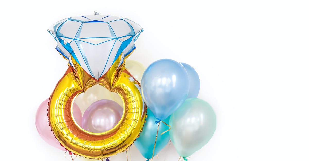 Green ring on resources - Colorful glossy different shaped balloons in studio