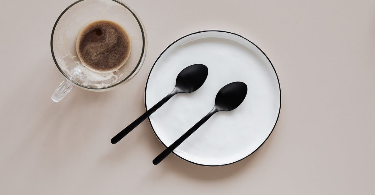 Gta 4 Missing Shadow setting - From above composition of ceramic plate with black spoons placed near glass cup of coffee on beige table Gta 4 Missing Shadow setting - From above composition of ceramic plate with black spoons placed near glass cup of coffee on beige table