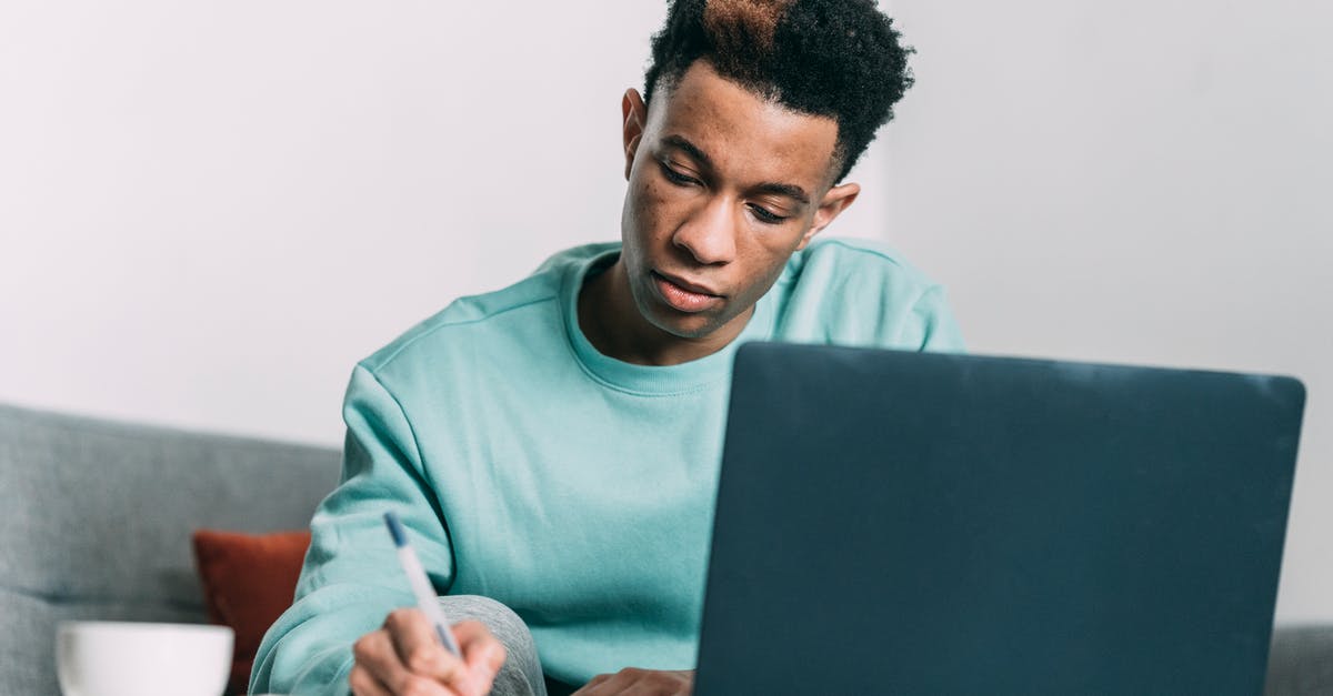 GTA 5 Online missions not appearing? - Contemplative black man with dyed hair taking notes near laptop GTA 5 Online missions not appearing? - Contemplative black man with dyed hair taking notes near laptop
