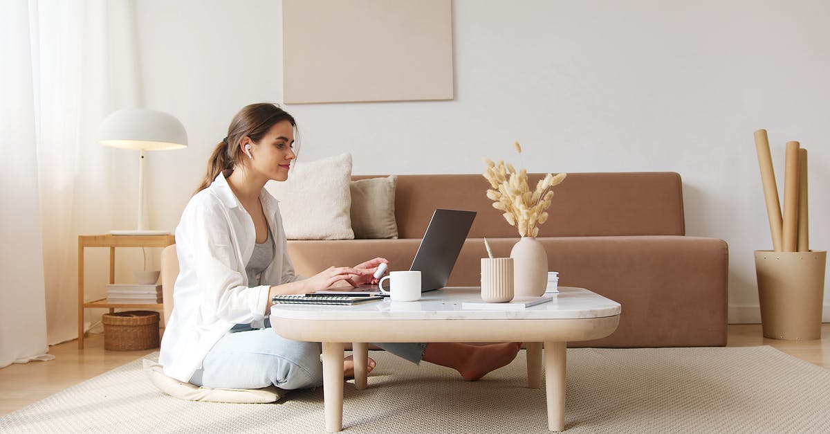 GTA not using full GPU capacity - Content woman using laptop on floor GTA not using full GPU capacity - Content woman using laptop on floor