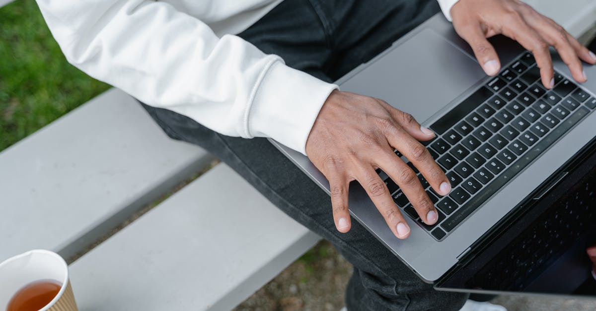 Guilds not working on iOS? - Person in White Dress Shirt and Black Denim Jeans Using Macbook Pro Guilds not working on iOS? - Person in White Dress Shirt and Black Denim Jeans Using Macbook Pro