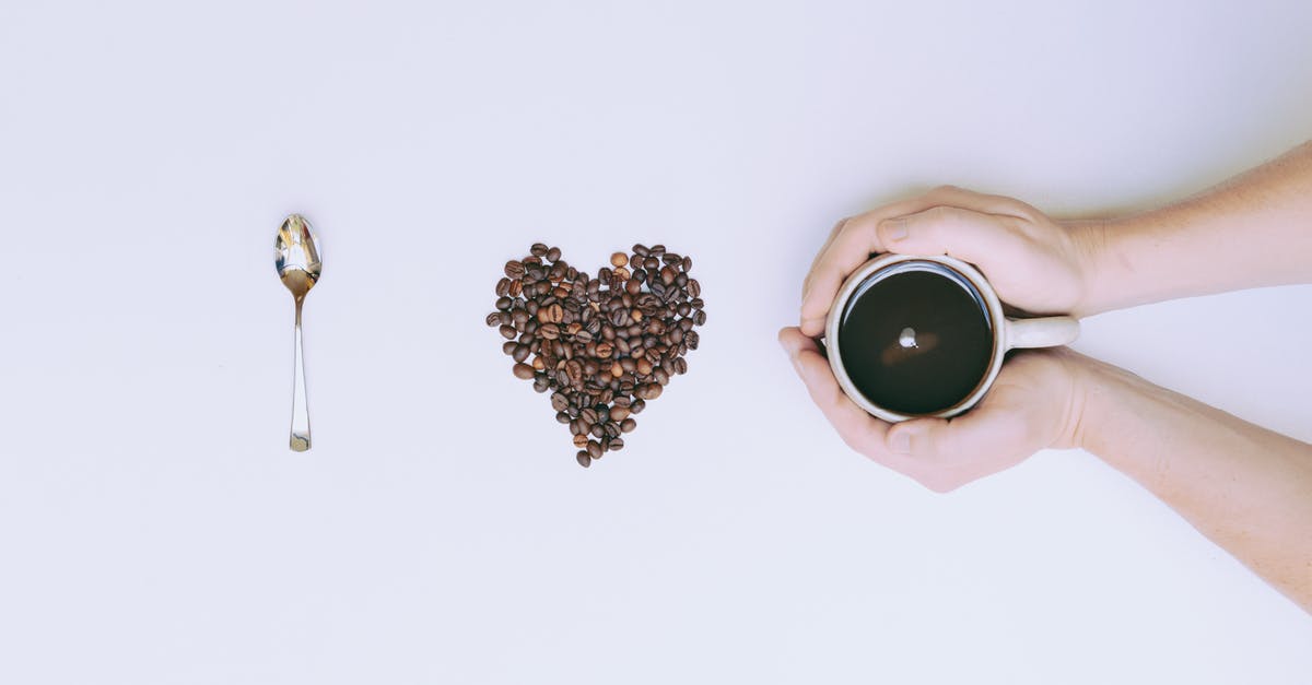 Half Life symbol on Portal.exe? [closed] - Flat Lay Photography of Mug and Coffee Bean