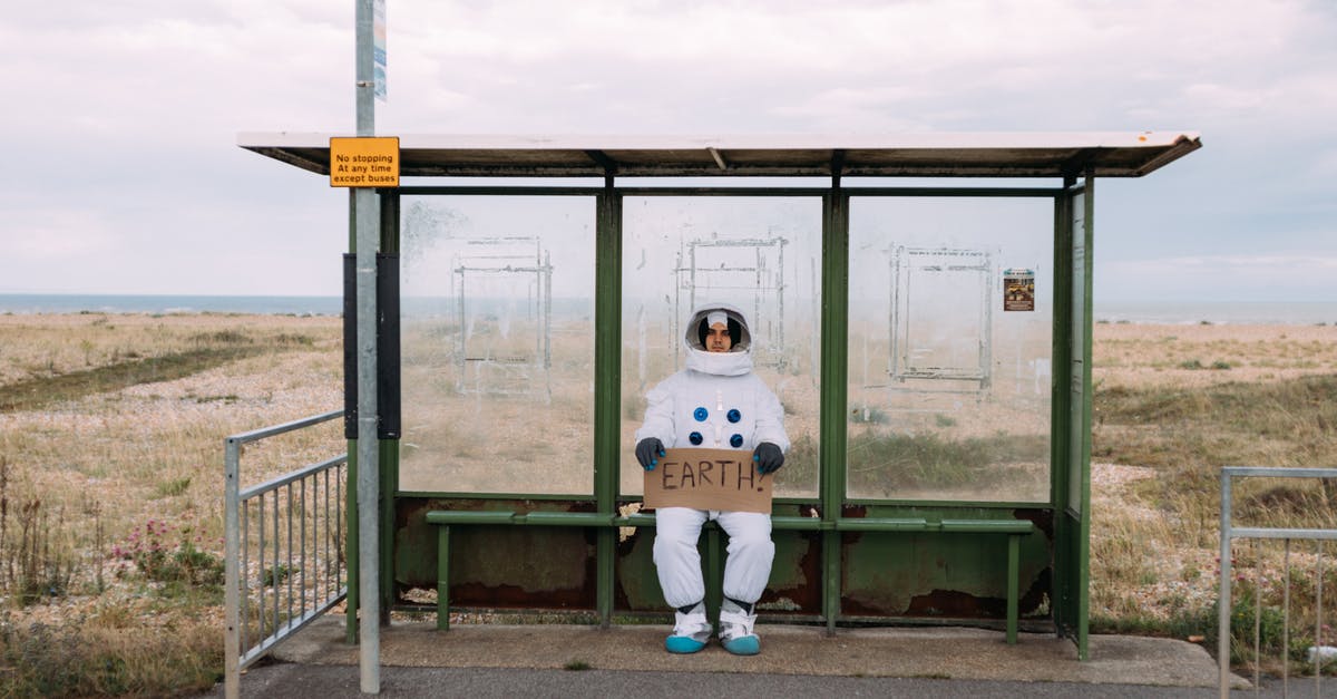 Halloween Themed Outfits - Astronaut Waiting At A Bus Stop Halloween Themed Outfits - Astronaut Waiting At A Bus Stop