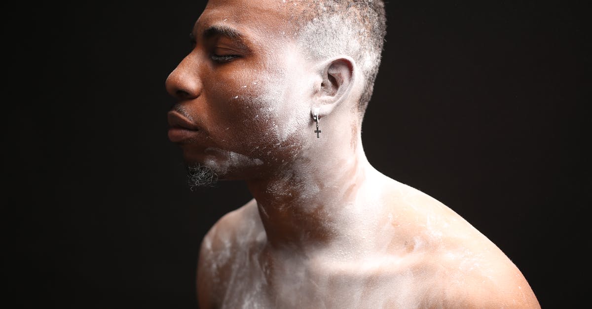 handling the cover based shooting sections of Watch Dogs more effectively - Adult African American guy covered with white powder closing eyes against black background handling the cover based shooting sections of Watch Dogs more effectively - Adult African American guy covered with white powder closing eyes against black background