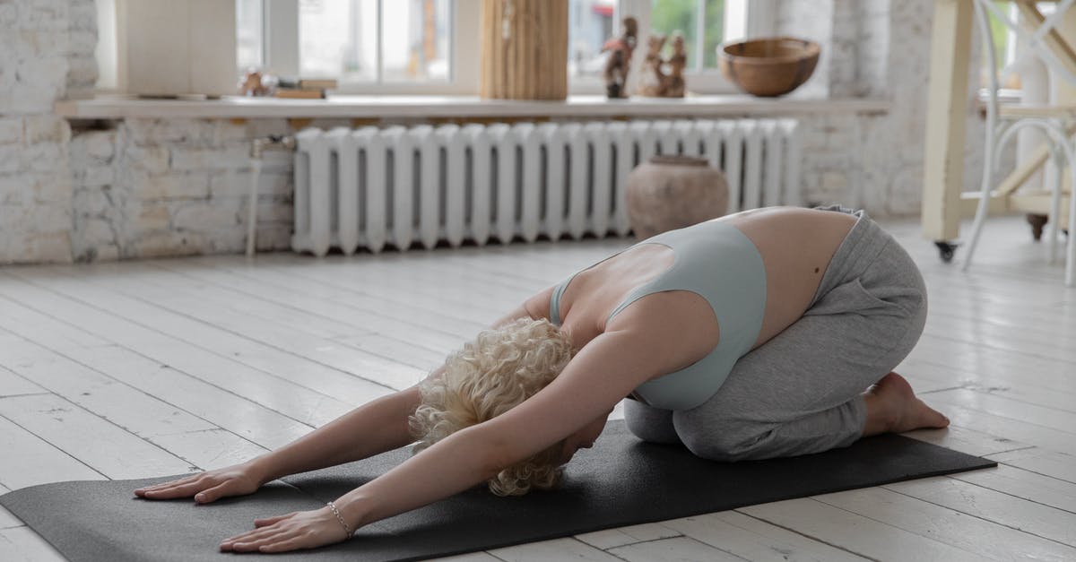 Harrim's quest - siding with kobolds - Anonymous woman stretching body in Extended Child s yoga pose