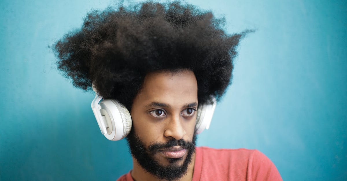 Have Elite Dangerous use Stereo instead of Hands-Free? - Content ethnic man in casual outfit using white headphones Have Elite Dangerous use Stereo instead of Hands-Free? - Content ethnic man in casual outfit using white headphones