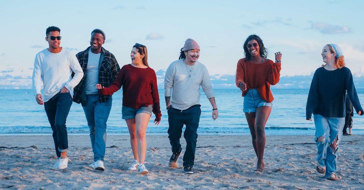 Have we completed Diablo 3 in 9 hours? - Group of Friends Walking on Beach Shore