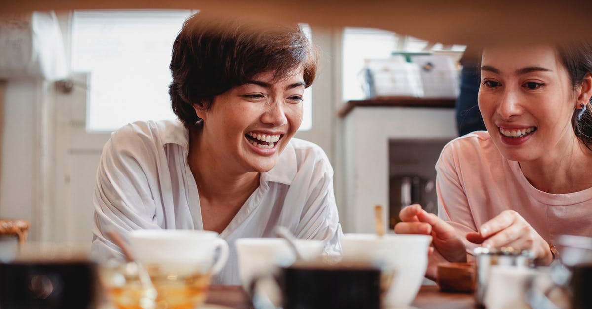 Have you got to re buy destiny and its DLC? - Happy young ethnic ladies having fun in store near table with dishware Have you got to re buy destiny and its DLC? - Happy young ethnic ladies having fun in store near table with dishware