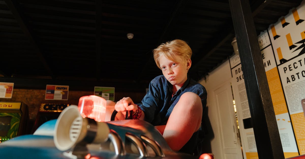 Haven't been able to play DOOM on vulkan driver - Woman in Blue and Red Polo Shirt Holding White Ceramic Mug