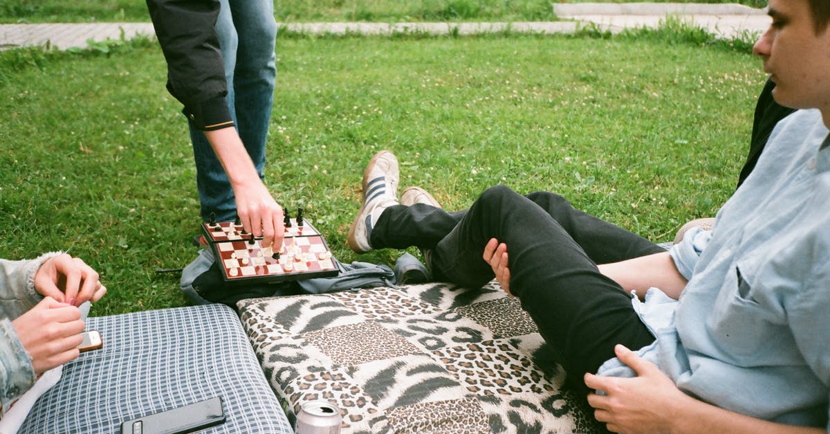 Having game sounds played through voice chat - Group of friends in summer park