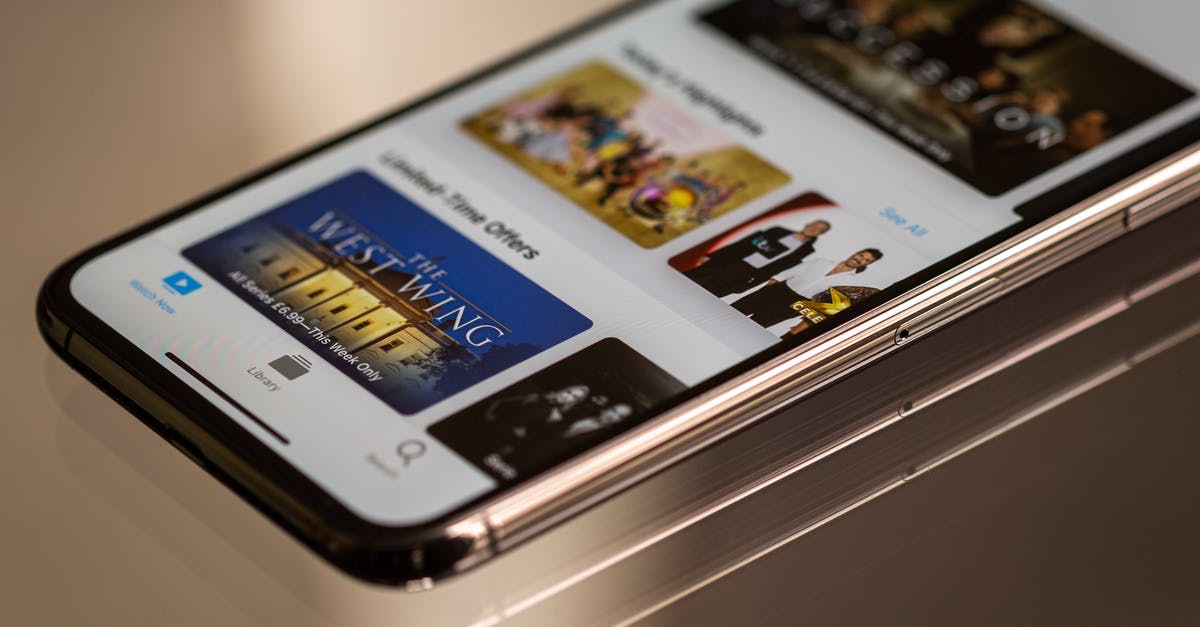 HDTV and Apple TV into Xbox One - A Smartphone In Close-up View HDTV and Apple TV into Xbox One - A Smartphone In Close-up View