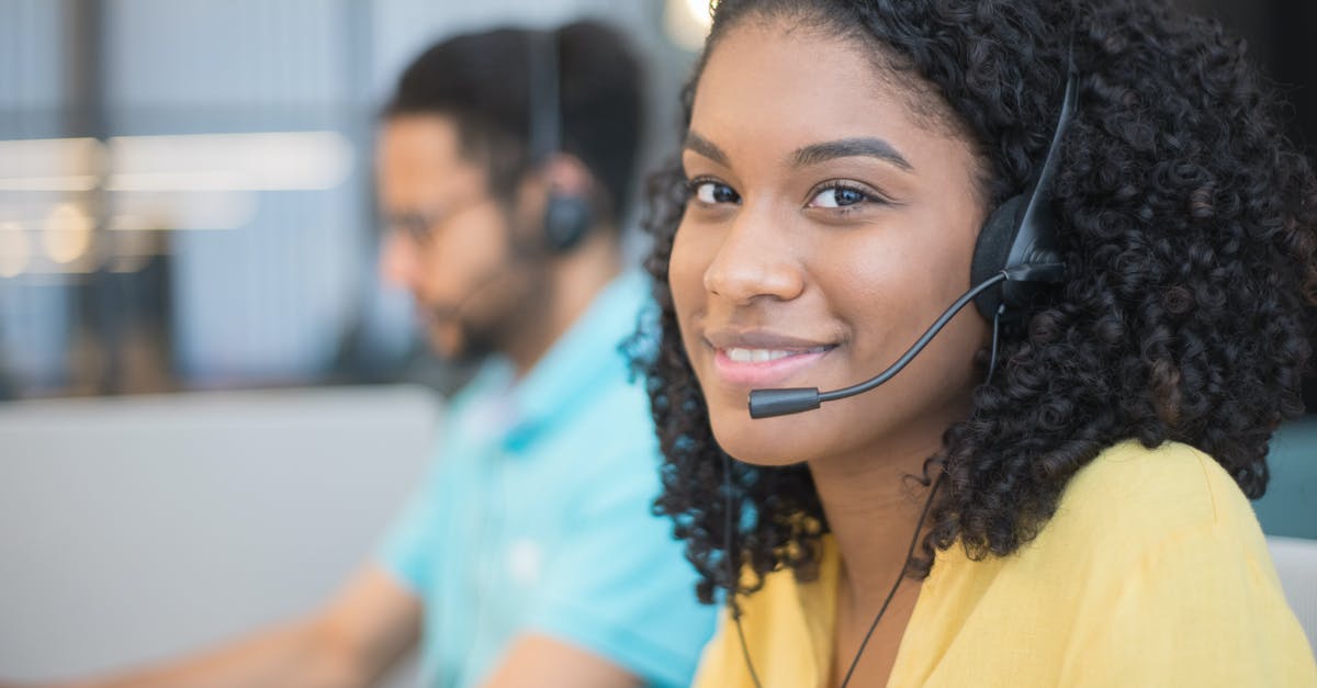Headset problem after Xbox One Update - Close-Up Shot of a Curly-Haired Girl Wearing Headphones