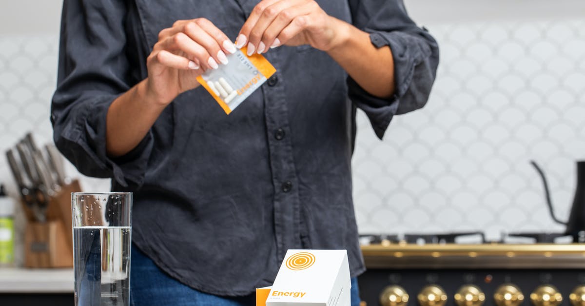 Hearthstone Pack Opening Interuption - A Person Holding a Pack of Pills 