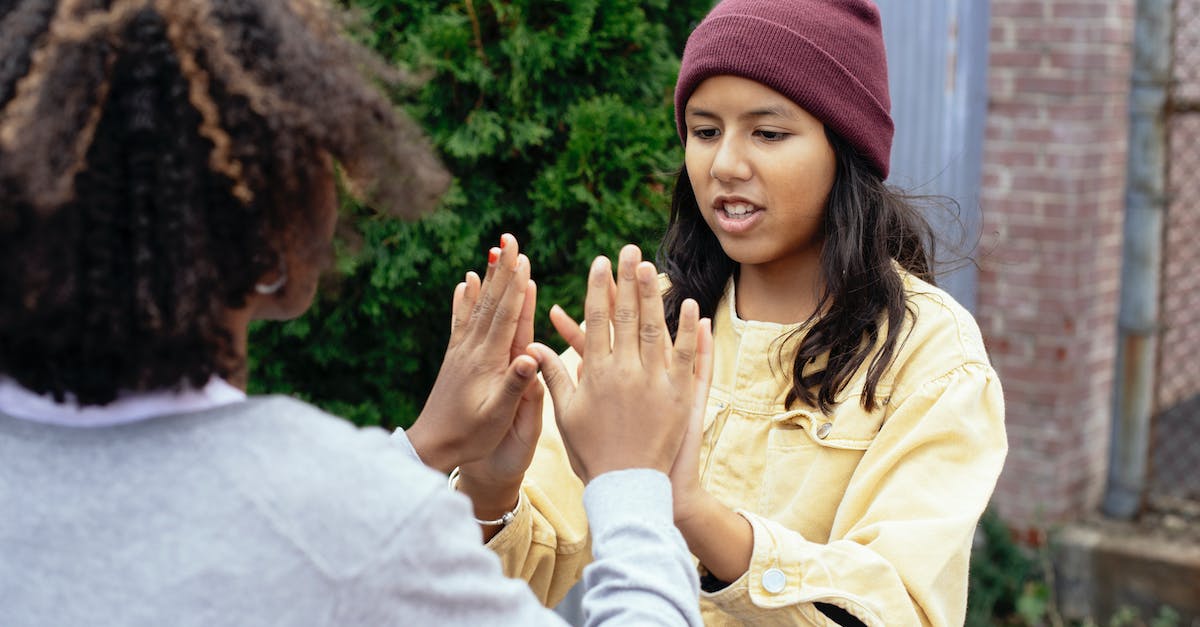 Help finding a Minecraft friend on whatever server that I don't play on or know [closed] - Multiethnic schoolgirls learning game with hands