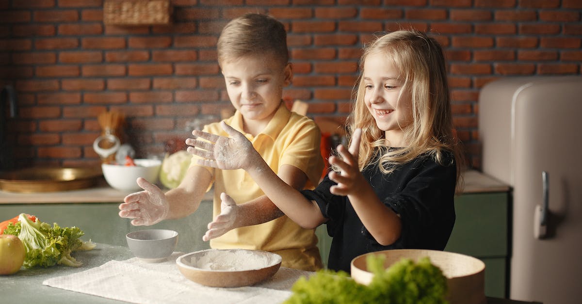 Help finding a Minecraft friend on whatever server that I don't play on or know [closed] - Happy children putting flour on hands in kitchen in apartment