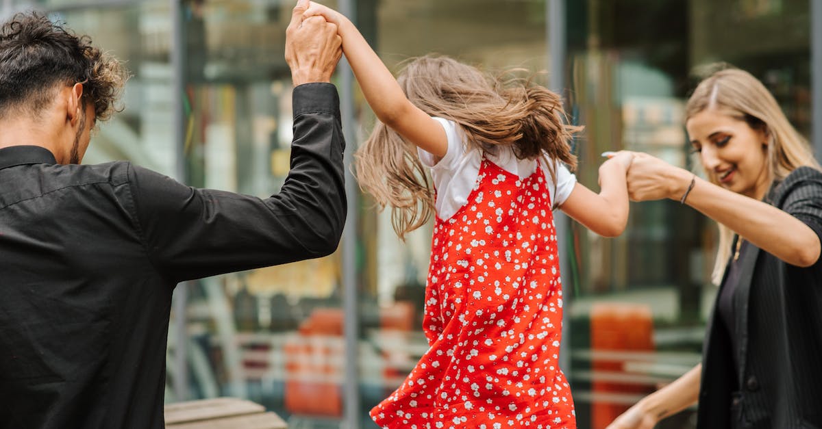 Help Playing DOS Game - Family spending time together on street