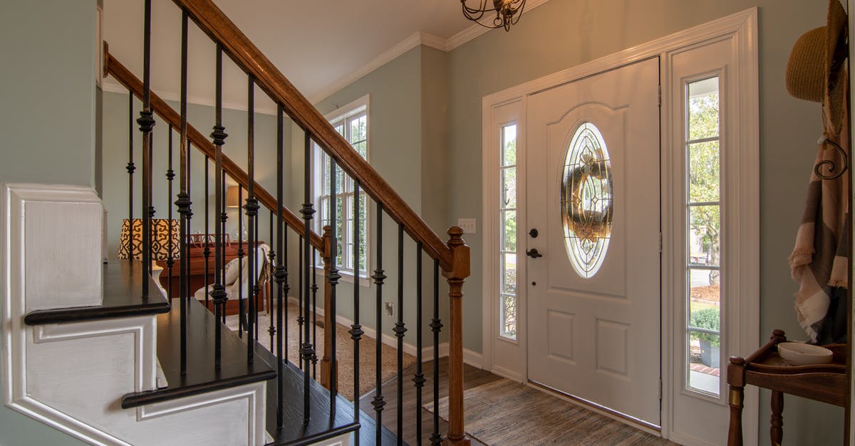 Housing steps and requirements in Caesar 3 - Brown Wooden Staircase With Brass Chandelier
