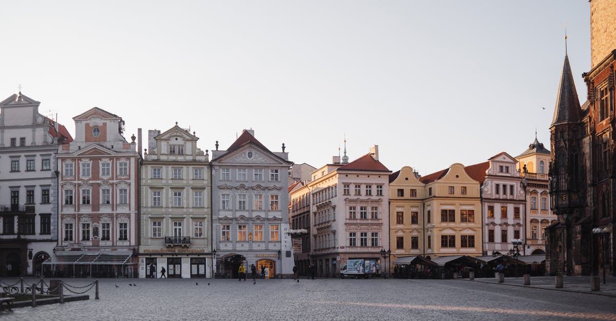 How are CS:GO eSport competitive leagues typically structured? [closed] - Old fashioned historic bright residential houses lined up next to each other on paved spacious street in city against cloudless sky