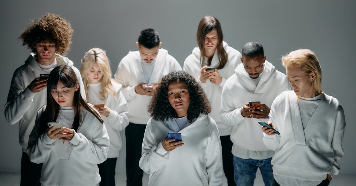How are experience points divided between players in Borderlands? - Photo of People Engaged on their Phones How are experience points divided between players in Borderlands? - Photo of People Engaged on their Phones