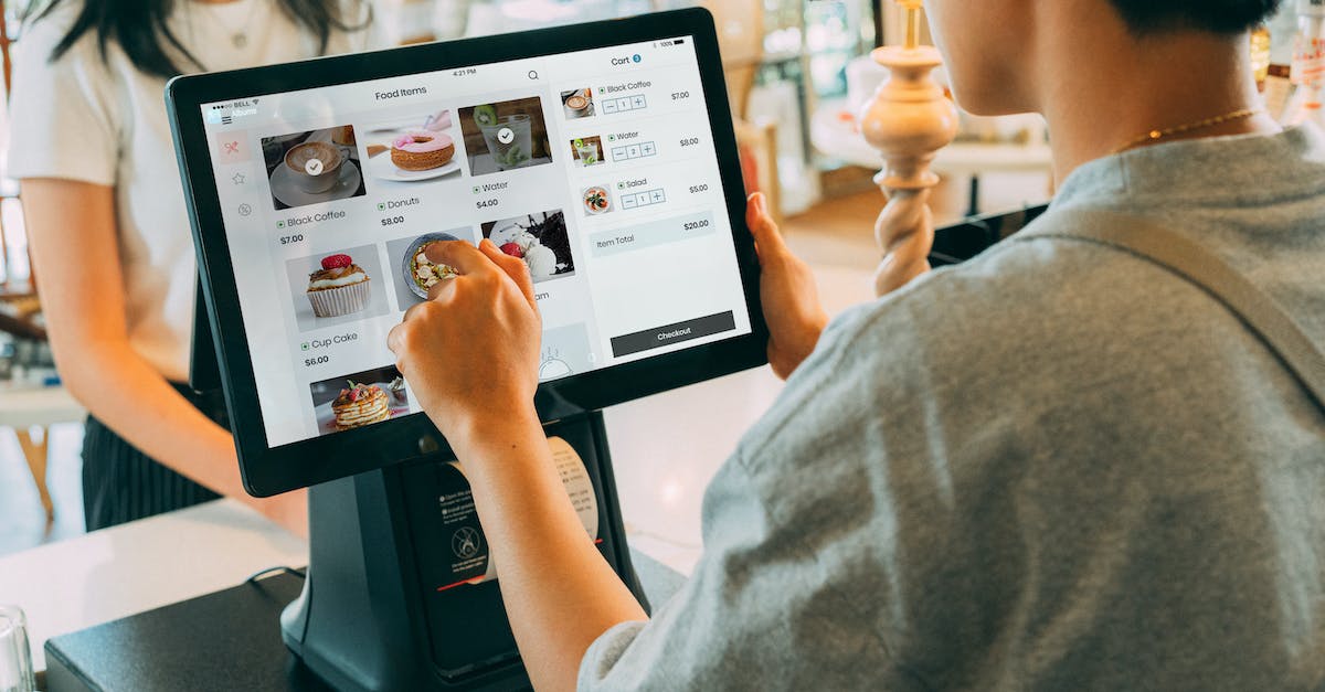how are LP(League Points) acquired? - Woman in Gray Shirt Holding Black Ipad how are LP(League Points) acquired? - Woman in Gray Shirt Holding Black Ipad