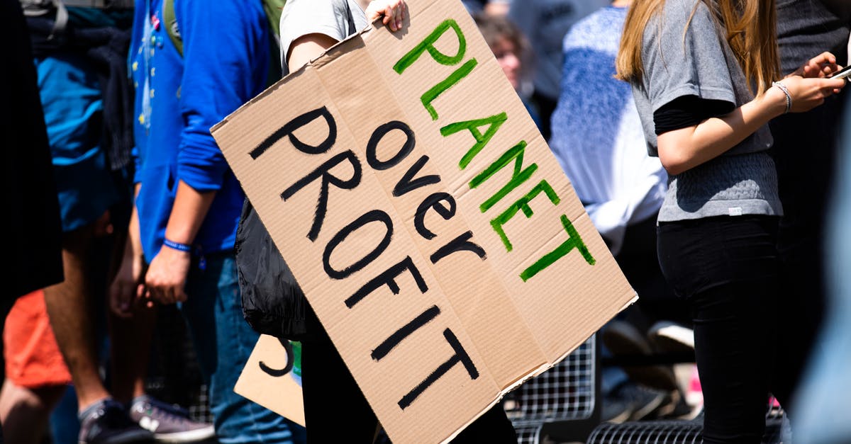 How are signs affected without swords? - Woman in Blue Jacket Holding White and Black I Am Happy to Be Happy Print Paper How are signs affected without swords? - Woman in Blue Jacket Holding White and Black I Am Happy to Be Happy Print Paper