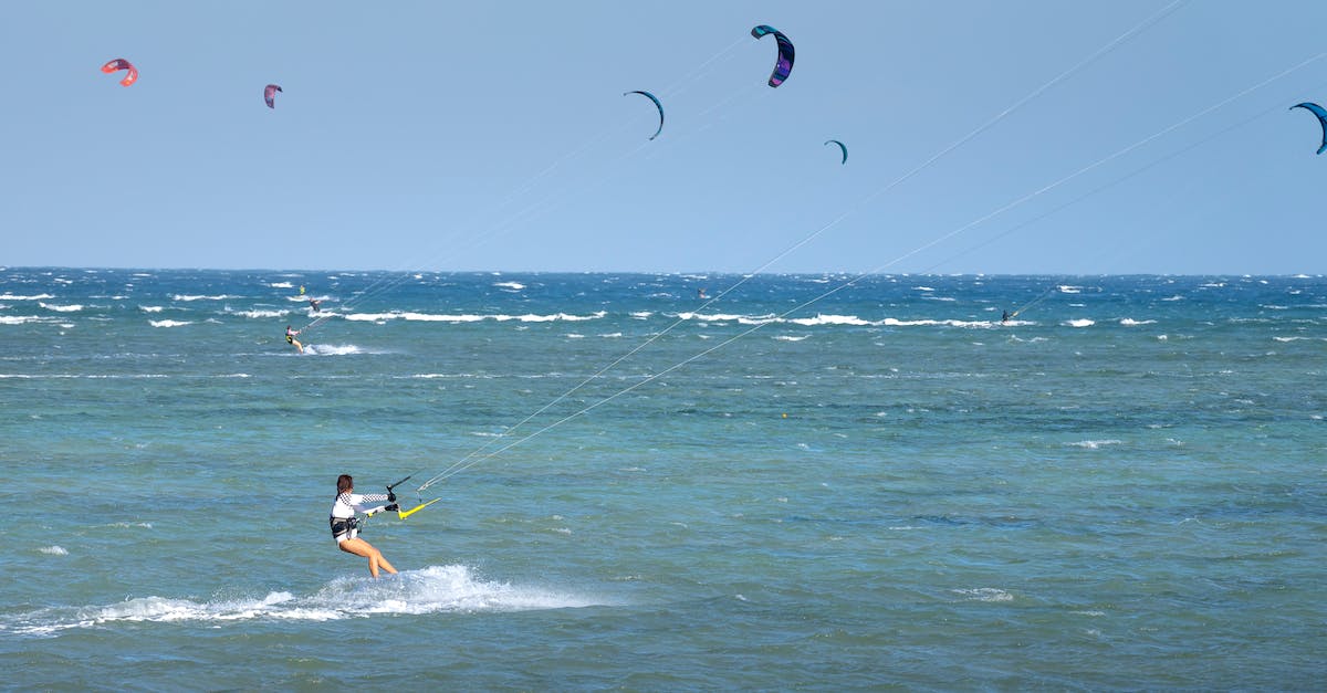 How can I attack move click to kite while only targeting champs? - Anonymous lady practicing kitesurfing in ocean under blue sky How can I attack move click to kite while only targeting champs? - Anonymous lady practicing kitesurfing in ocean under blue sky