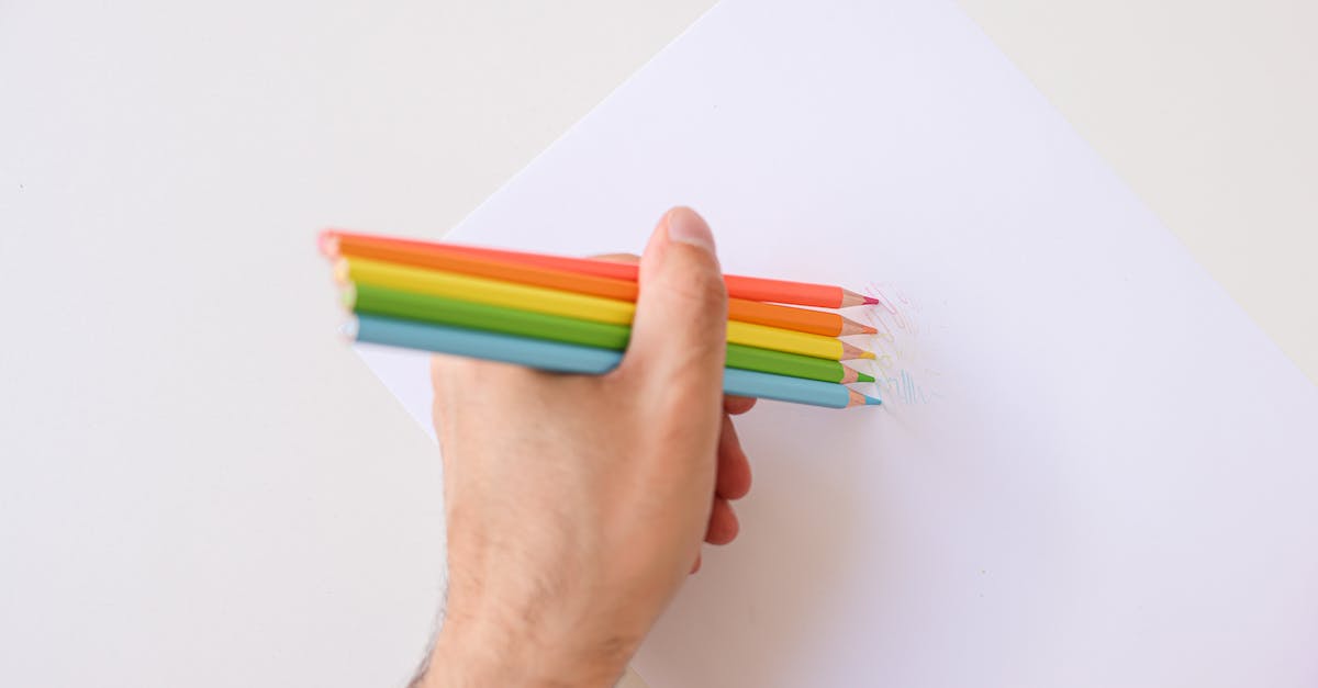 How can I beat Rainbow Summit? - Person Holding Green and Red Coloring Pencils