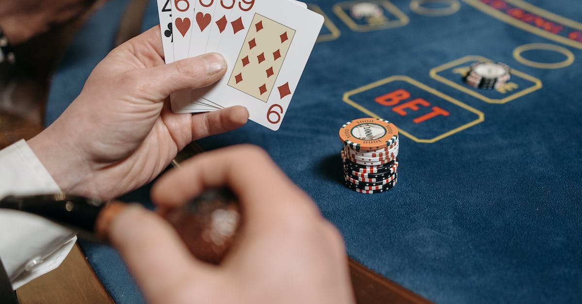 How can I beat the Compulsive Gambler in Gem Minder 2? - Person Holding 10 of Diamonds Playing Card