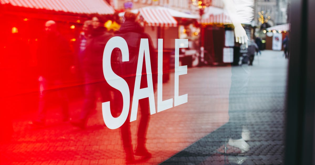 How can I build a 'shop' that trades score for weaponry? - Crowd of people walking on street near shop showcase How can I build a 'shop' that trades score for weaponry? - Crowd of people walking on street near shop showcase