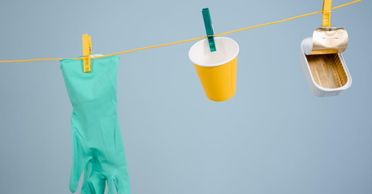 How can I cancel lock picking? - Teal Rubber Gloves Hanging Beside Yellow Cup and Can