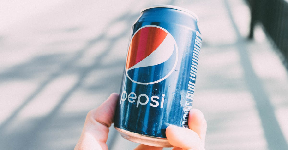 How can I change the subtitle language in Blues and bullets on my Playstation 4? - Person Holding Pepsi Can