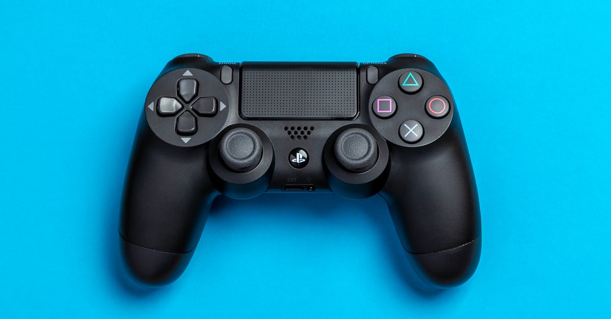 How can I change the subtitle language in Blues and bullets on my Playstation 4? - Flat Lay Photo of Black Sony PS4 Game Controller on Blue Background