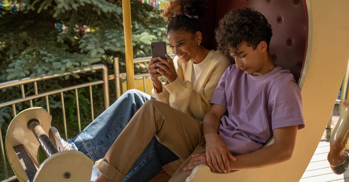 How can I check the first date of a Steam game being played in my library? - Teenage couple sitting in carousel seat and girl taking selfie How can I check the first date of a Steam game being played in my library? - Teenage couple sitting in carousel seat and girl taking selfie