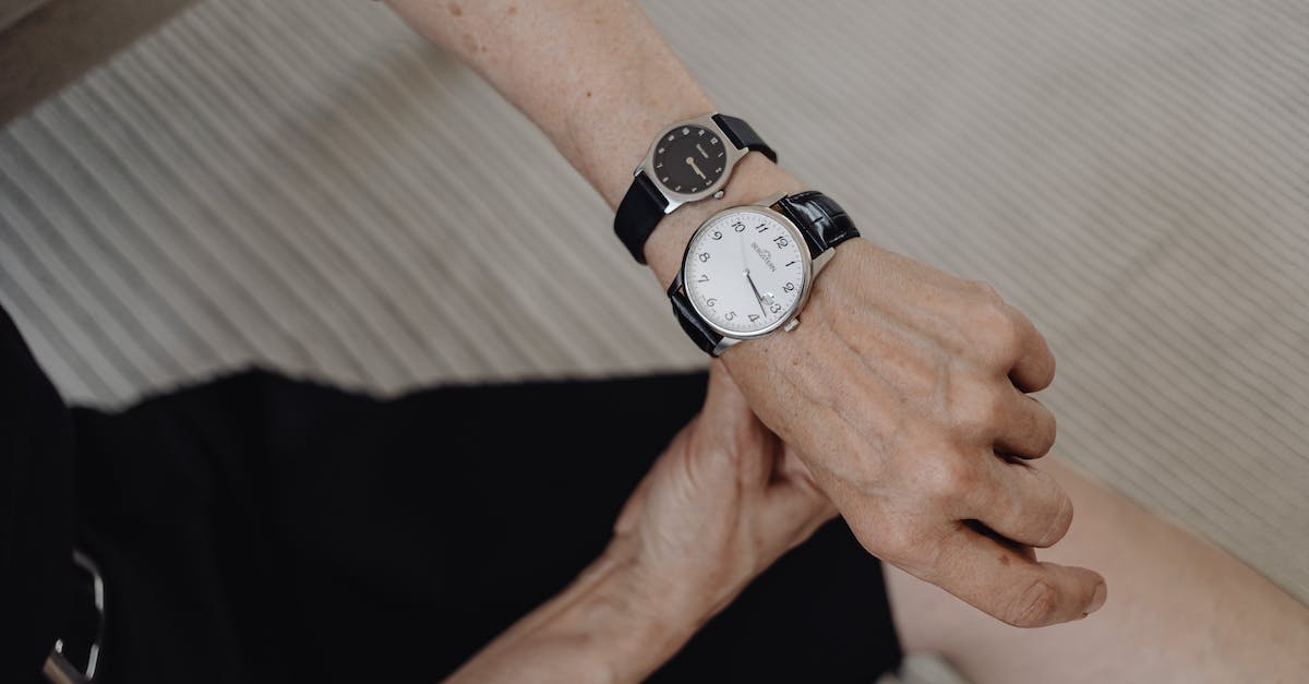 How can I deal with early pressure as the British in AoE3 vanilla? - Person Wearing Silver and White Analog Watch