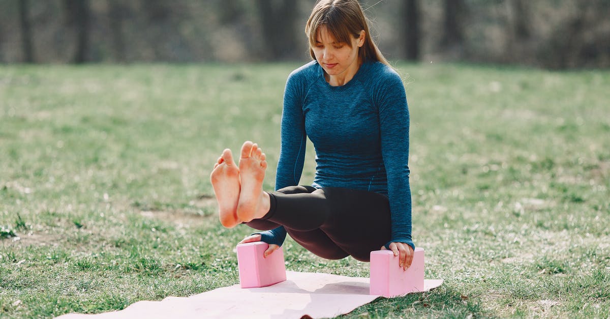 How can I determine the bottleneck for block lag? - Full body barefoot sportswoman in sportswear doing yoga arm exercise on sport mat during training on lawn in park adhering to healthy lifestyle while looking down