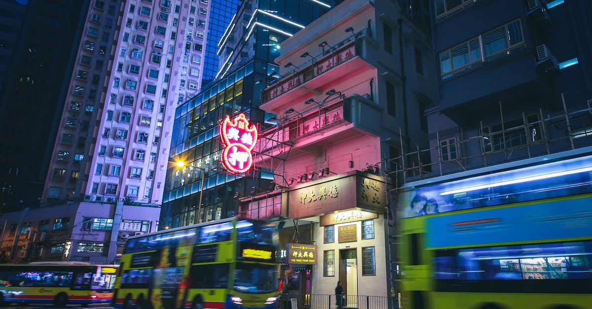 How can I disable the pawn shop alarm in Fallout 3: DC Interiors Mod? - Buildings in Downtown Hong Kong at Night