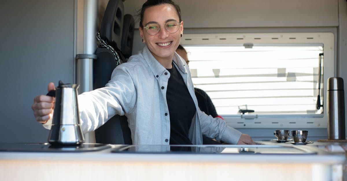 How can I get the option to ask if an RV camper can move in? - A Happy Woman Grabbing a Coffee Pot