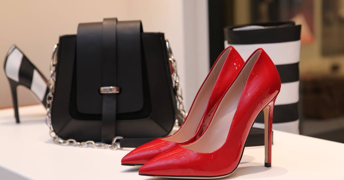 How can I get the shop worker's luxuries need met? - Close-up of Shoes And Bag