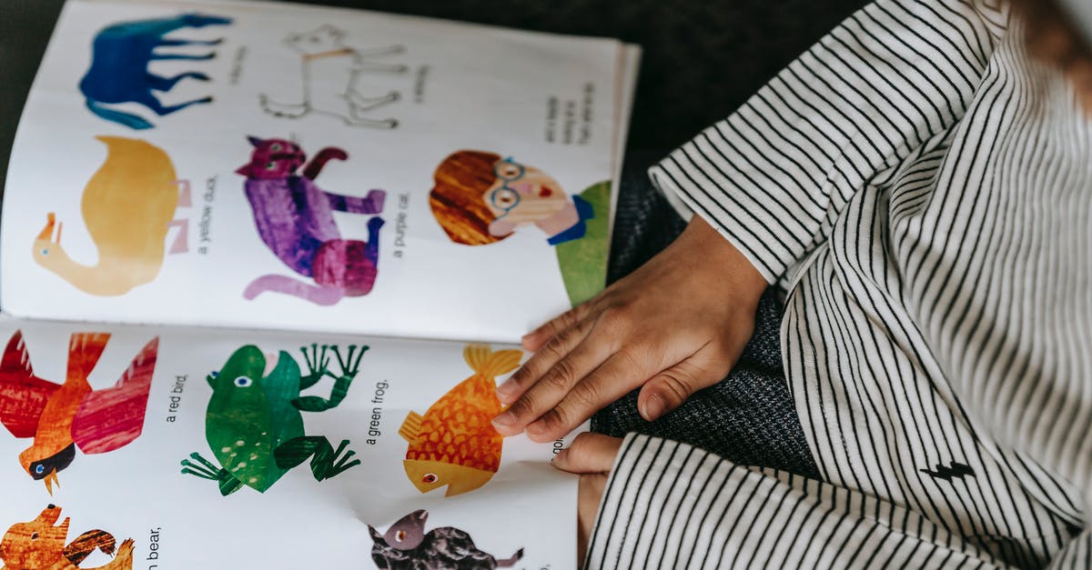 How can I have data be different for three identical blocks? - From above of crop anonymous child reading interesting book with colorful pictures of different animals