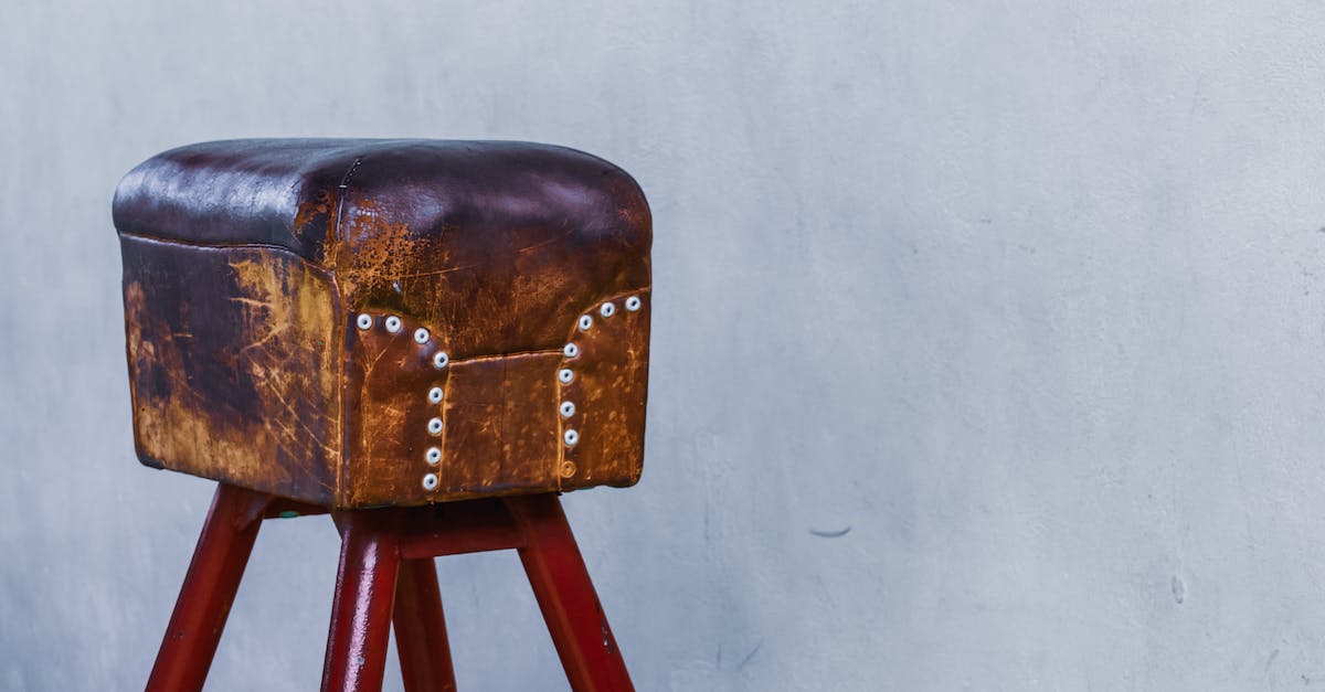 How can I increase the strength of my Vault Dwellers? - Old school retro shabby leather vault artistic gymnastics apparatus placed against gray background
