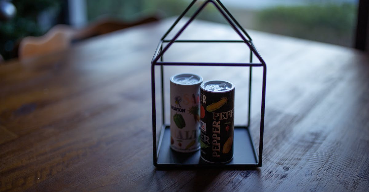 How can I kill Jenny o' the Woods? - Two Labeled Thin Cans on Black Frame How can I kill Jenny o' the Woods? - Two Labeled Thin Cans on Black Frame