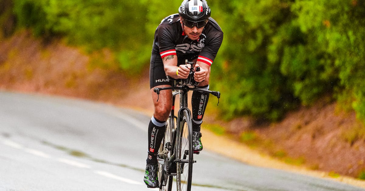 How can I make a Giant with full diamond armor (Protection IV) riding a bat with spawner - Concentrated man in helmet riding bike on paved road